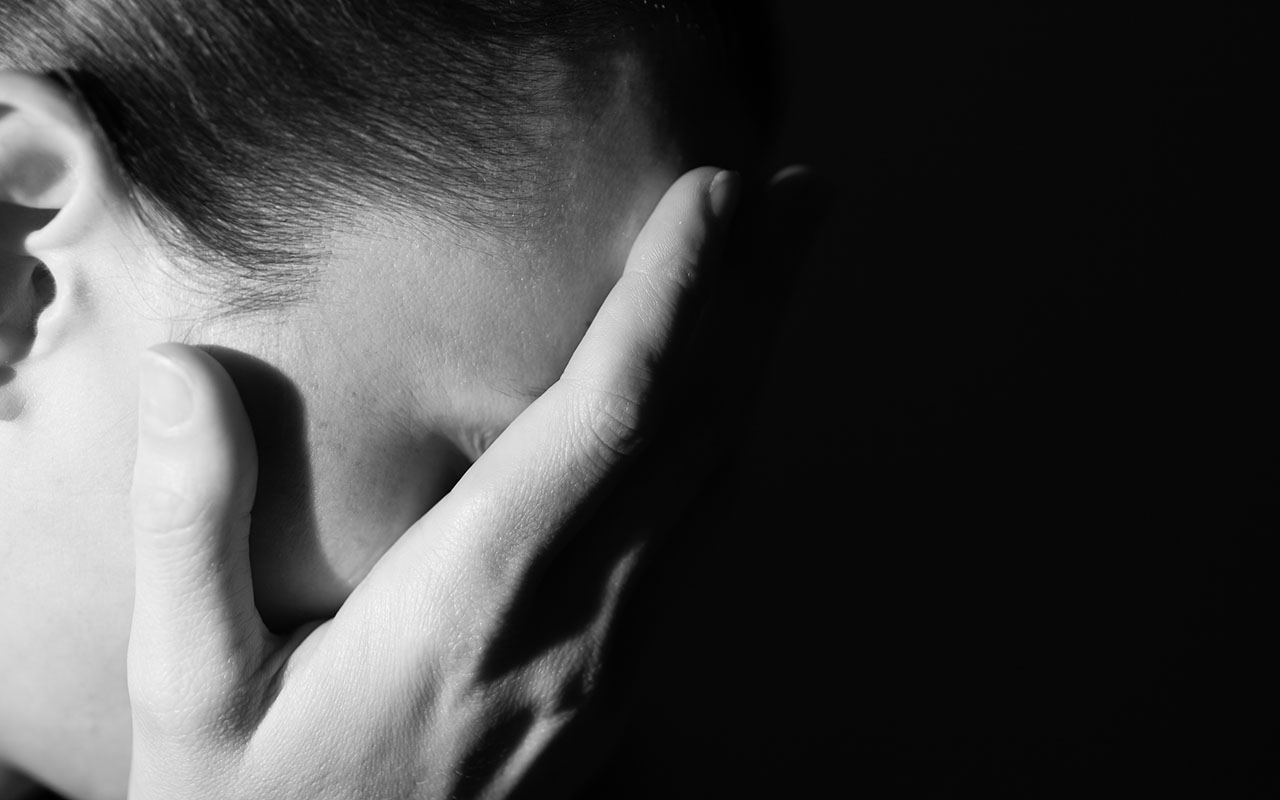 Black and white portrait of sad women.